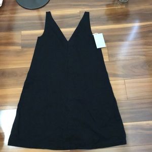 Black sleeveless dress by Everlane